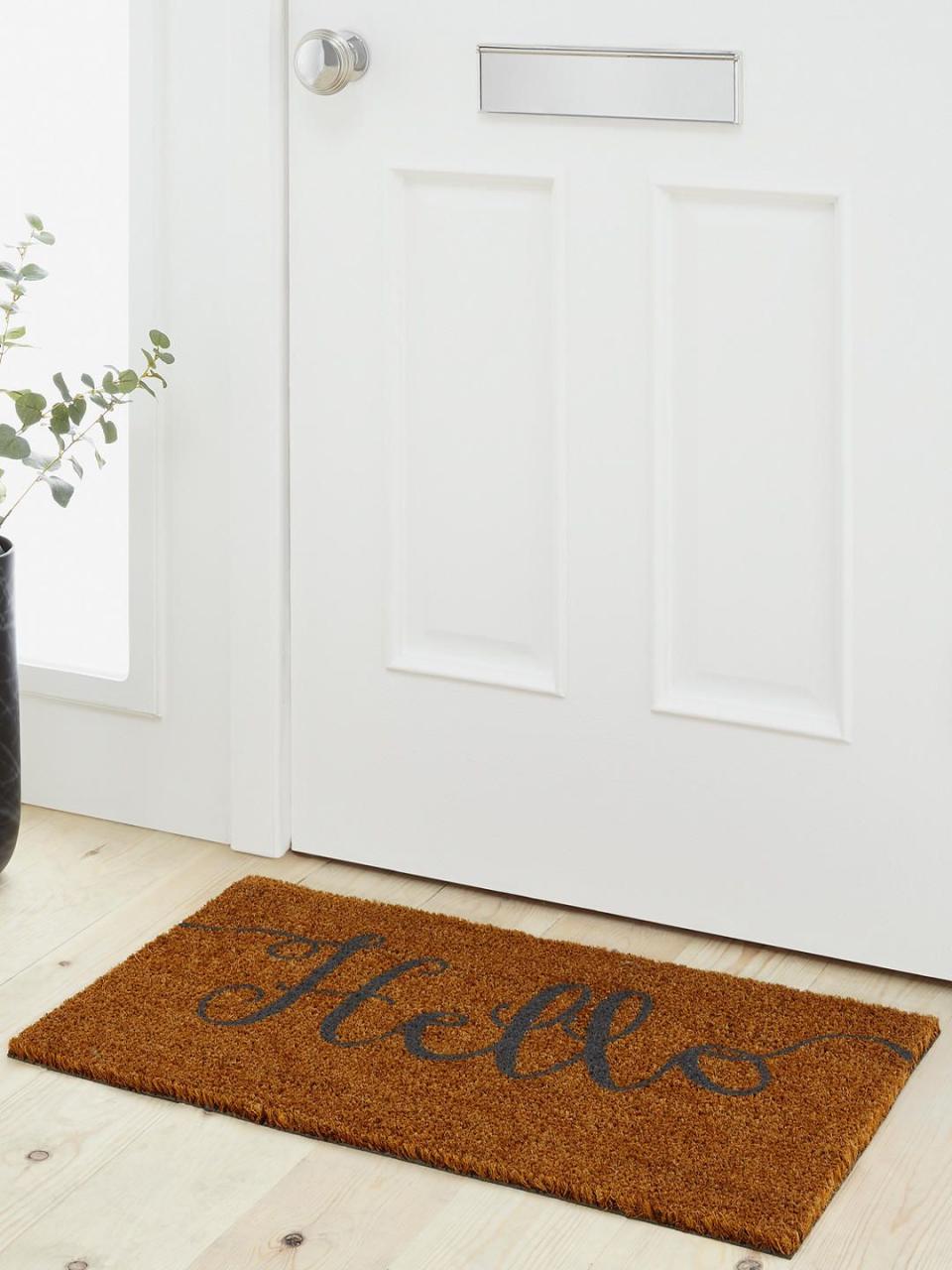 <p><strong>There's no better way to welcome your guests than with a doormat. Other than prompting them to wipe their feet, it instantly makes your house inviting. </strong></p><p>This thick, hard-wearing natural coir pile <a href="https://www.johnlewis.com/john-lewis-partners-hello-door-mat-natural/p2707174" rel="nofollow noopener" target="_blank" data-ylk="slk:'Hello' doormat;elm:context_link;itc:0;sec:content-canvas" class="link ">'Hello' doormat</a> from John Lewis is suitable for outside your front door and is a great way to welcome guests. Coir makes an excellent material for doormats as its roughness is good for removing mud – you just need a brush to keep it clean. </p><p><strong>Pictured: <a href="https://www.johnlewis.com/john-lewis-partners-hello-door-mat-natural/p2707174" rel="nofollow noopener" target="_blank" data-ylk="slk:Hello Door Mat, £10, John Lewis & Partners;elm:context_link;itc:0;sec:content-canvas" class="link ">Hello Door Mat, £10, John Lewis & Partners</a></strong></p><p><a class="link " href="https://go.redirectingat.com?id=127X1599956&url=https%3A%2F%2Fwww.johnlewis.com%2Fjohn-lewis-partners-hello-door-mat-natural%2Fp2707174&sref=https%3A%2F%2Fwww.housebeautiful.com%2Fuk%2Fdecorate%2Fexterior%2Fg26085893%2Finstagram-modern-front-doors%2F" rel="nofollow noopener" target="_blank" data-ylk="slk:BUY NOW;elm:context_link;itc:0;sec:content-canvas">BUY NOW</a></p>