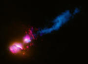 This composite photo provided by NASA shows A powerful jet from a supermassive black hole is blasting a nearby galaxy in the system known as 3C321, according to new results from NASA. This galactic violence, never seen before, could have a profound effect on any planets in the path of the jet and trigger a burst of star formation in the wake of its destruction. (AP Photo/NASA)