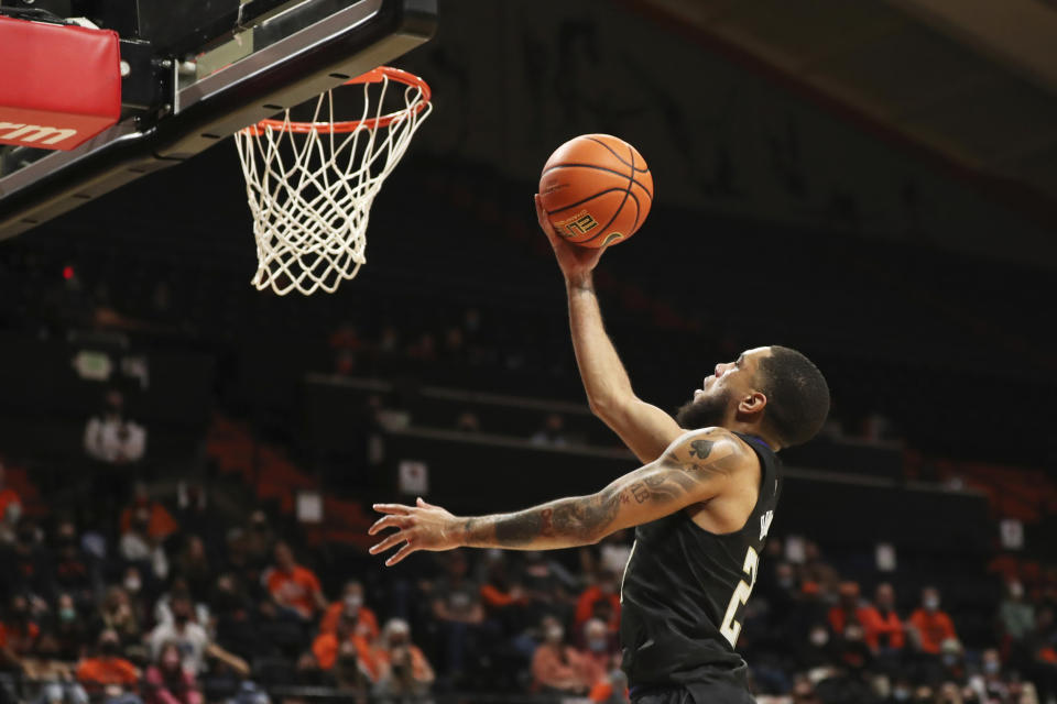 Washington's Terrell Brown Jr. (23) drives to the basket against Oregon State during the second half of an NCAA college basketball game Thursday, Jan. 20, 2022, in Corvallis, Ore. Washington won 82-72. (AP Photo/Amanda Loman)