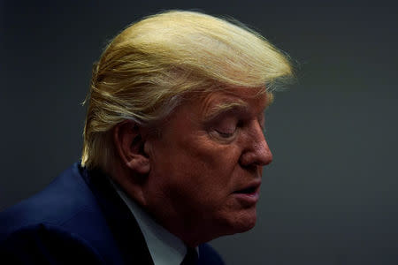 President Donald Trump speaks with reporters at the White House in Washington, November 28, 2017. REUTERS/Jonathan Ernst