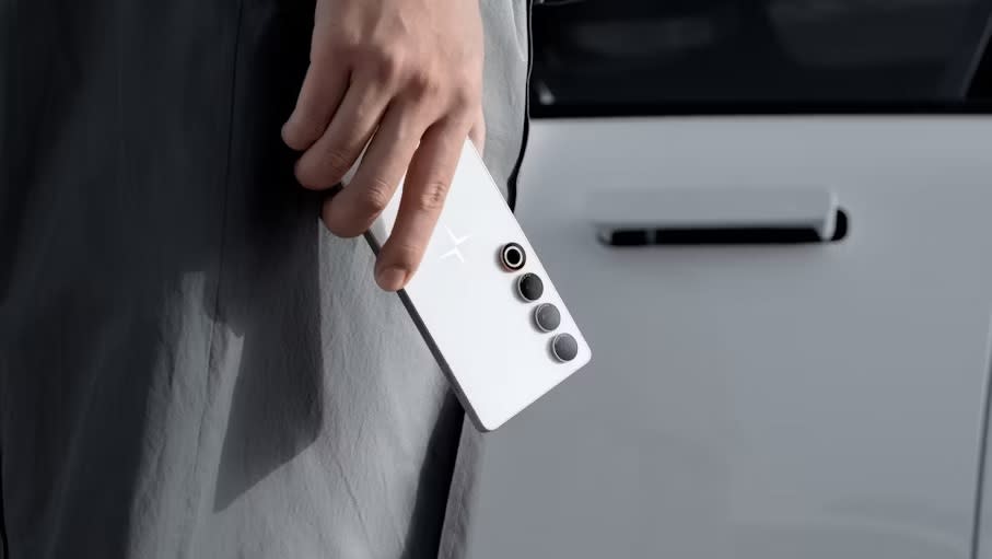 The Polestar Phone being used as a digital car key.