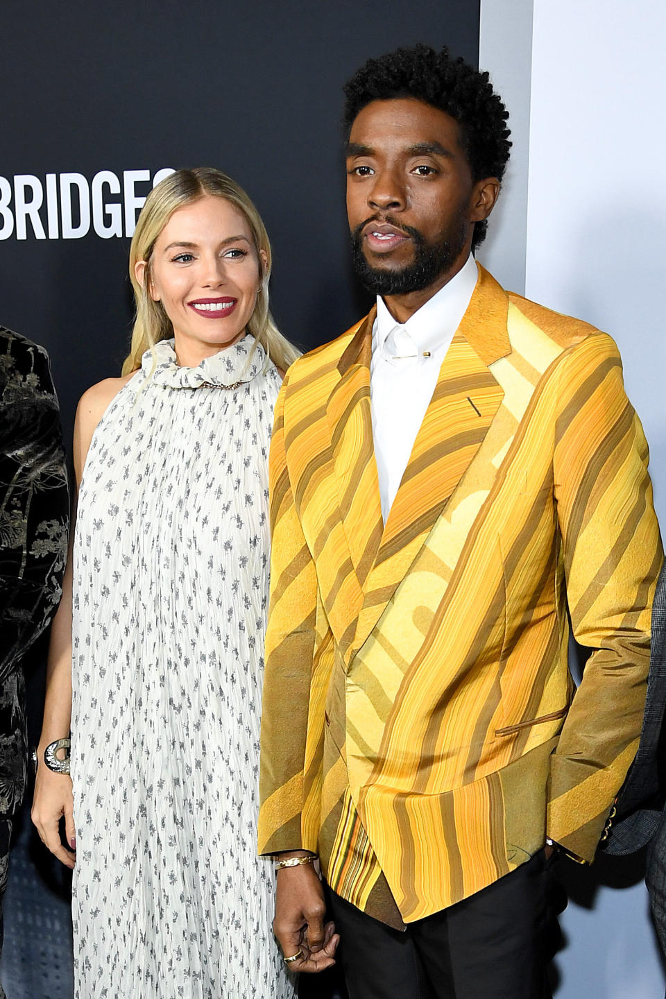 Sienna Miller and Chadwick Boseman attend a screening of  "21 Bridges" in November 2019, in which they both starred. In a new interview, Miller details an act of generosity on Boseman's part that took her by surprise. (Photo: Dimitrios Kambouris via Getty Images)