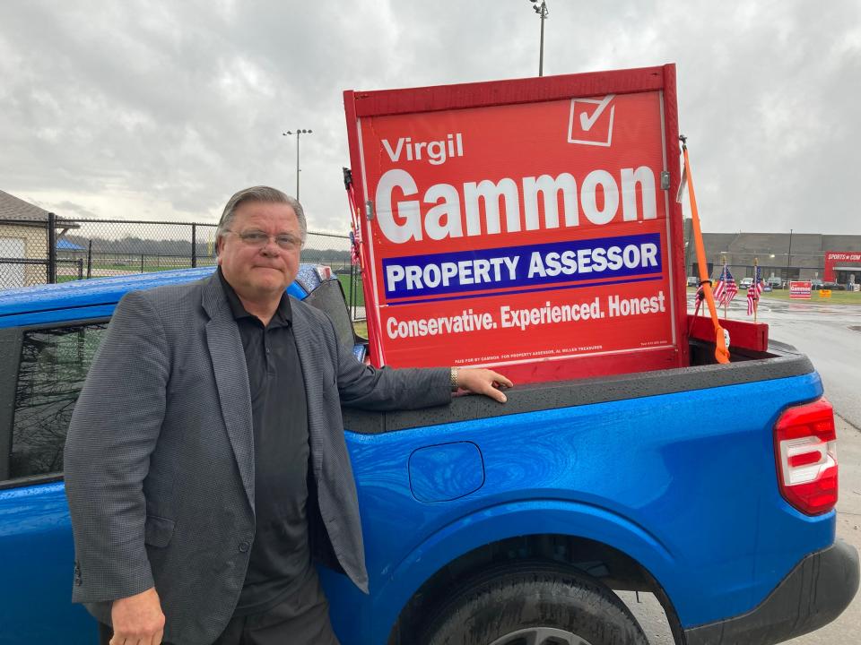 Virgil Gammon campaigns Tuesday for the Rutherford County Property Assessor office outside the SportsCom polling center in Murfreesboro.