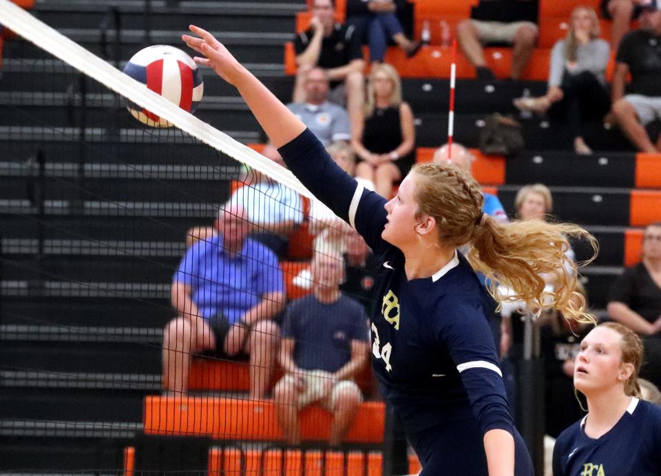 Providence Christian's McKenna Shotwell (34) records a kill during a 2023 match against rival MTCS. Shotwell, who led the Lady Lions to the DII-A state title, is the Player of the Year on the DNJ's all-area volleyball team.