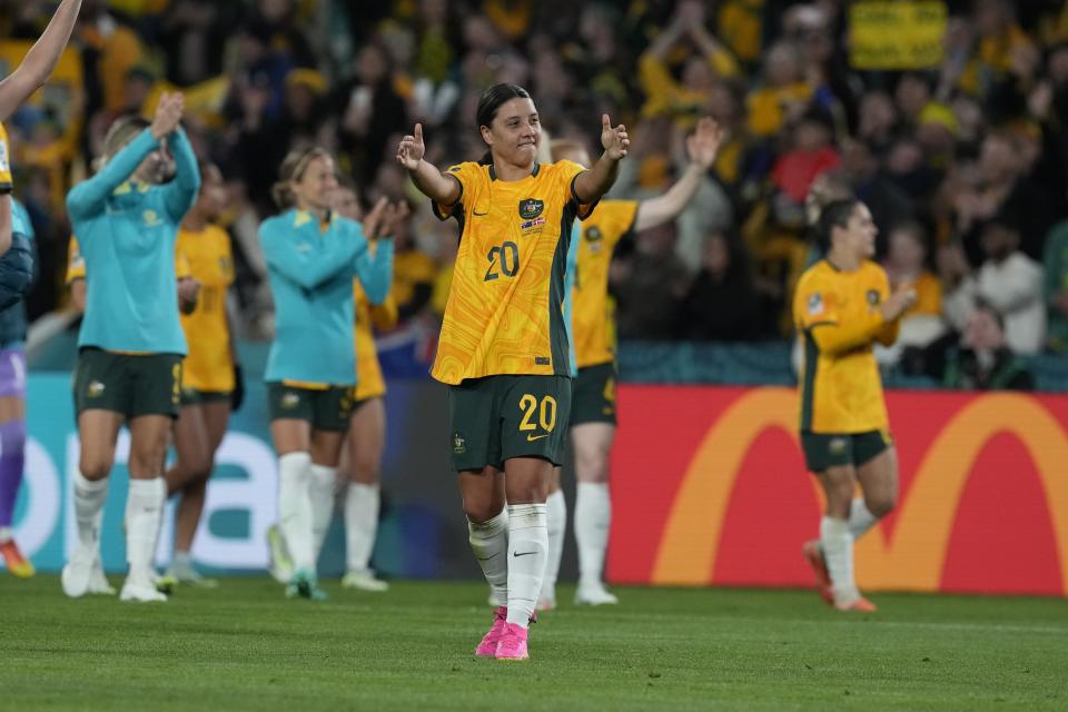 Australia's Sam Kerr applauds after the Women's World Cup round of 16 soccer match between Australia and Denmark at Stadium Australia in Sydney, Australia, Monday, Aug. 7, 2023. Australia won 2-0. (AP Photo/Mark Baker)