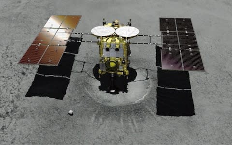  This computer graphic image provided by the Japan Aerospace Exploration Agency (JAXA) shows the Japanese unmanned spacecraft Hayabusa2 approaching on the asteroid Ryugu - Credit: AP