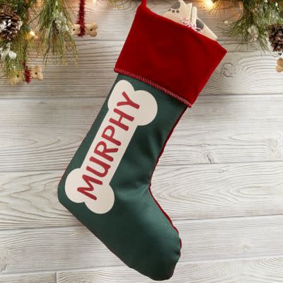 <p><a href="https://go.redirectingat.com?id=74968X1596630&url=https%3A%2F%2Fwww.bedbathandbeyond.com%2Fstore%2Fproduct%2Fdog-bone-personalized-christmas-stocking%2F5539277&sref=https%3A%2F%2Fwww.redbookmag.com%2Flife%2Fcharity%2Fg46202514%2Fbest-christmas-stockings%2F" rel="nofollow noopener" target="_blank" data-ylk="slk:Shop Now;elm:context_link;itc:0;sec:content-canvas" class="link ">Shop Now</a></p><p>Dog Bone Personalized Christmas Stocking</p><p>bedbathandbeyond.com</p><p>$26.99</p><span class="copyright">Bed Bath & Beyond</span>