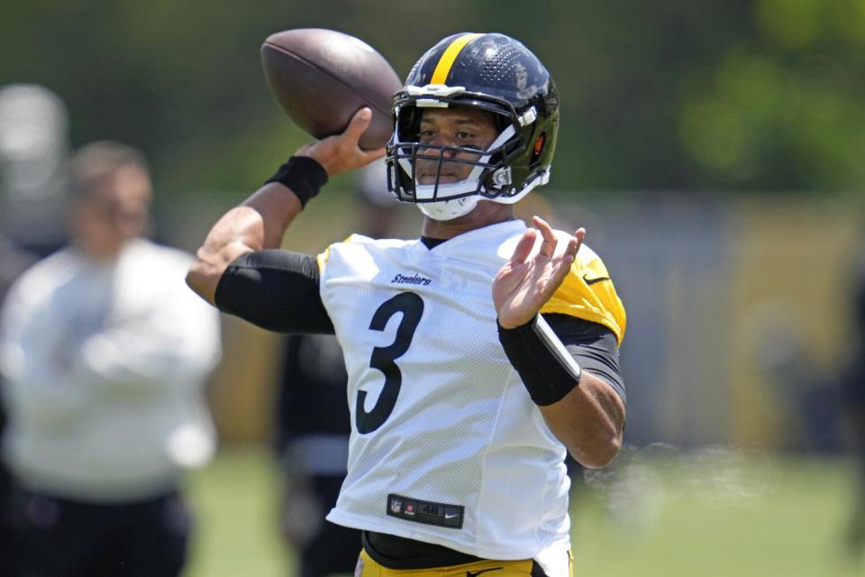 Pittsburgh Steelers quarterback Russell Wilson throws a pass during practice.