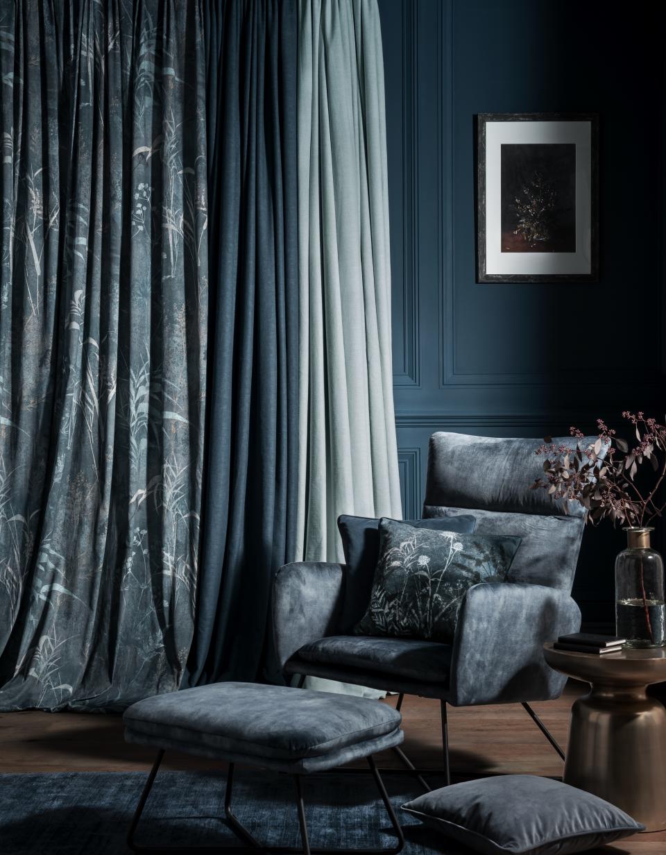 <p> A single fabric can add interest to your country curtain ideas, but three different tones will bring an extra dimension to your window treatments. </p> <p> &#x2018;This room coordinates Majestic paint and Restore Midnight curtains, creating a simple monochromatic colour palette to add a contemporary edge to the more traditional room style,&#x2019; explains Amy Bant, Soft Furnishings and Interiors Expert at Graham &amp; Brown. </p> <p> Pick two or more fabrics in shades from light to dark. They can be put on a single track, creating a trio of toning colors extending across the window. Alternatively, create a layered effect using separate tracks with a different fabric on each. That way, the curtains can be pulled across singly or together, to create a range of monochrome total effects. </p>