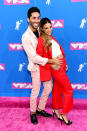 <p>Nev Schulman and Laura Perlongo attend the 2018 MTV Video Music Awards at Radio City Music Hall on August 20, 2018 in New York City. (Photo: Nicholas Hunt/Getty Images for MTV) </p>