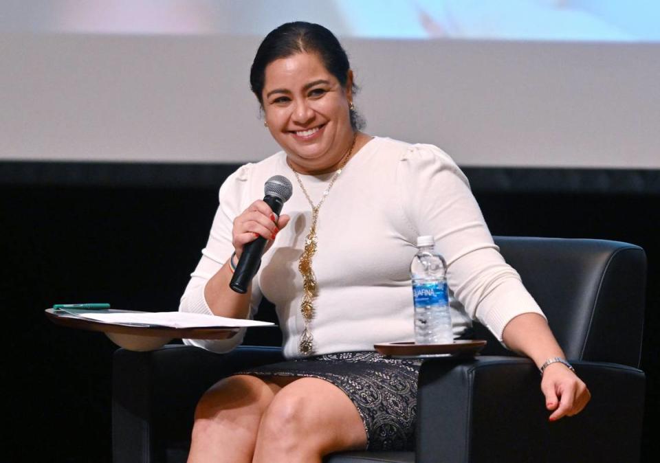 Mexican Consul Adriana González Carrillo smiles as participates in the second panel discussion at the Stop The Hate Townhall, held Thursday evening, Sept. 28, 2023 at Fresno City College\'s Old Administration Building theater in Fresno. The forum featured three separate panel discussions addressing the impact of hate crimes in the Fresno LGBTQ+ community.