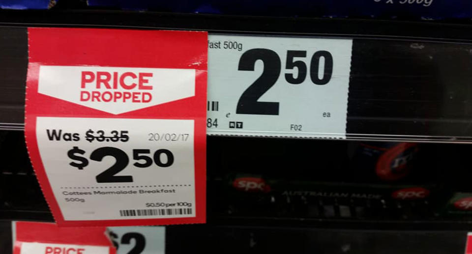 Marmalade price ticket shown to match a red "price drop" tag inside Queensland Woolworths.