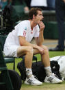 Andy Murray of Great Britain reacts after being defeated in his Gentlemen's Singles final match against Roger Federer at Wimbledon.