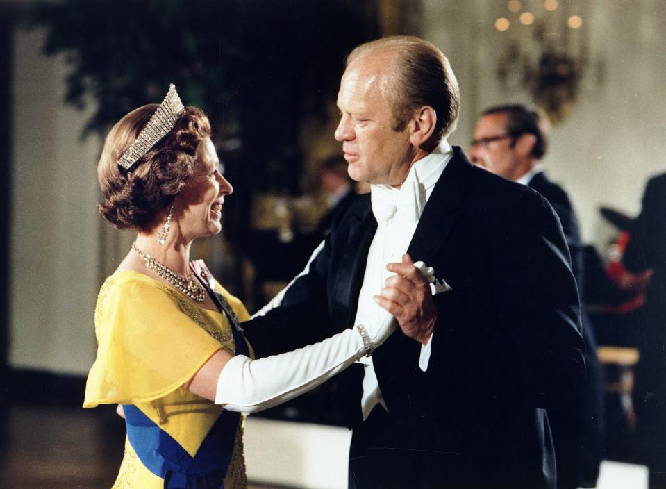 Queen Elizabeth II dances with President Gerald Ford at a state dinner at the White House in 1976.