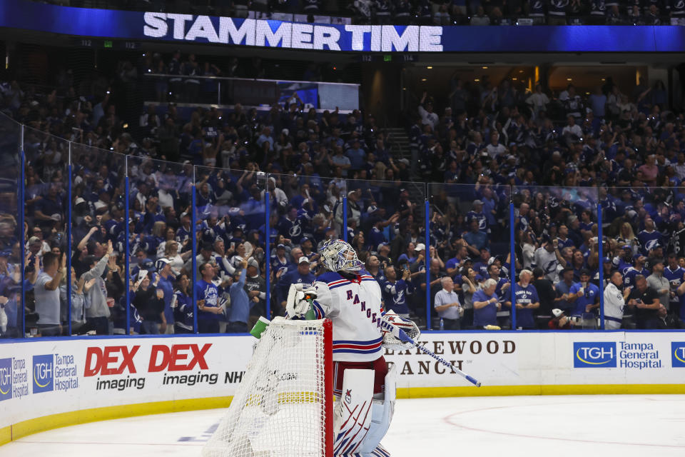 TAMPA, FL - JUNE 7: Fans of the Tampa Bay Lightning celebrate a goal by Steven Stamkos #91 against goalie Igor Shesterkin #31 of the New York Rangers during the third period in Game Four of the Eastern Conference Final of the 2022 Stanley Cup Playoffs at Amalie Arena on June 7, 2022 in Tampa, Florida. (Photo by Mark LoMoglio/NHLI via Getty Images)