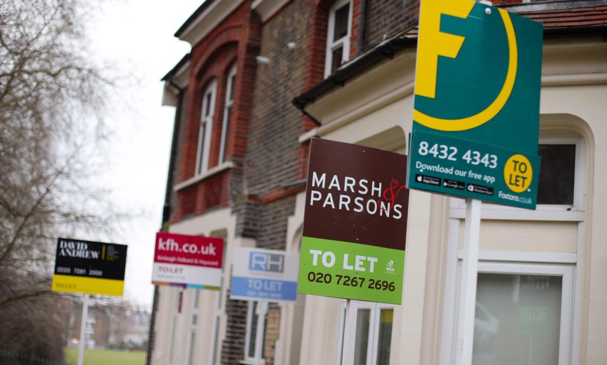 <span>Signs advertising private properties for rent in north London. </span><span>Photograph: Yui Mok/PA</span>