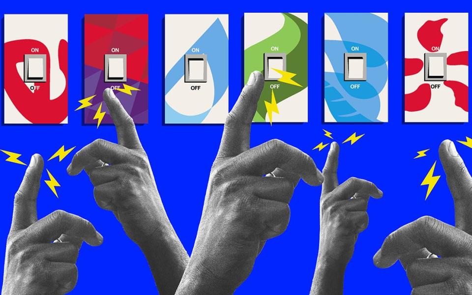 Hands pressing energy light switches