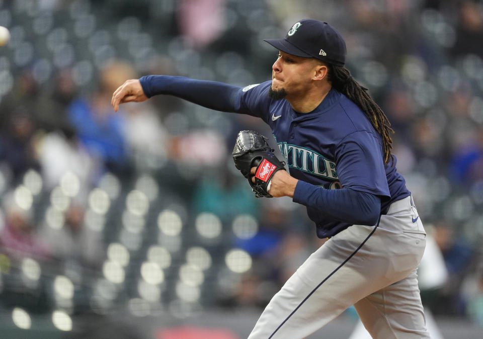 Seattle Mariners starting pitcher Luis Castillo works against the Colorado Rockies in the first inning of a baseball game Saturday, April 20, 2024, in Denver. (AP Photo/David Zalubowski)