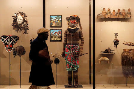 A journalist visits Belgium's Africa Museum before its reopening to the public on December 9, 2018, after five years of renovations to modernise the museum from pro-colonial propaganda exhibits to one that condemns colonisation, in Tervuren, Belgium December 6, 2018. Picture taken December 6, 2018. REUTERS/Yves Herman