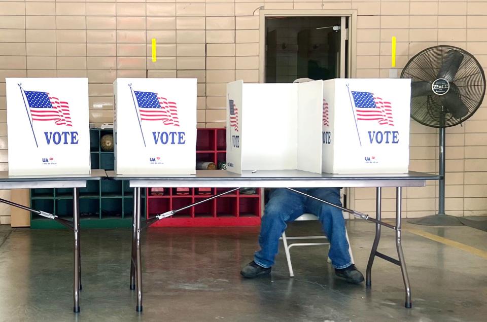 One of a few people who showed up at the polls early, an older gentleman votes in the Mississippi congressional primary election at Jackson Fire Station 7 in Jackson, Miss., Tuesday, June 7, 2022.