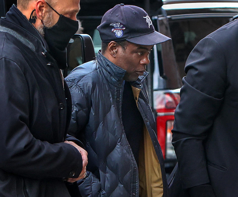 Boston, MA - March 30: Actor/comedian Chris Rock enters the Wilbur Theater in Boston for the first of his two sold-out performances on March 30, 2022. Three days earlier, Rock was slapped by Will Smith at the Academy Awards. (Photo by Barry Chin/The Boston Globe via Getty Images)