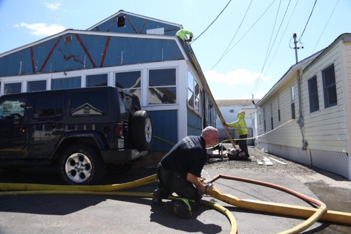 Firefighters knocked down a fire on the first floor of the two-story home at 19 Perkins Ave. at Hampton Beach.