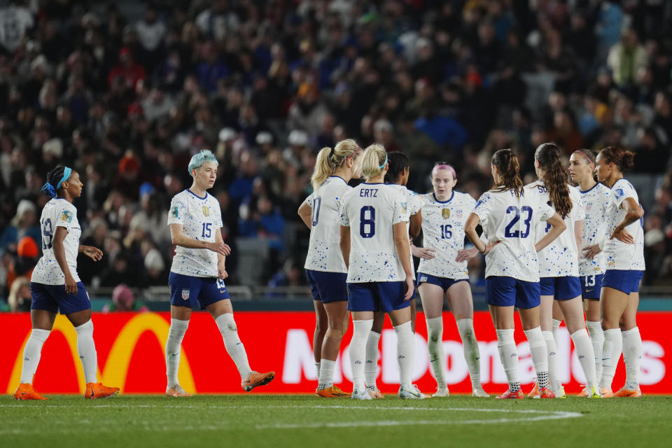 US team talk during a break in the Women's World Cup Group E soccer match between Portugal and the United States at Eden Park in Auckland, New Zealand, Tuesday, Aug. 1, 2023. (AP Photo/Abbie Parr)