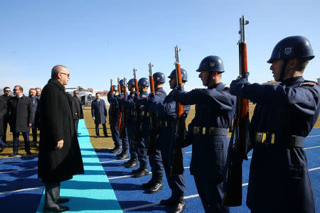 Turkish President Tayyip Erdogan reviews a guard of honour as he arrives a meeting in Kutahya, Turkey, January 20, 2018. Kayhan Ozer/Presidential Palace/Handout via REUTERS