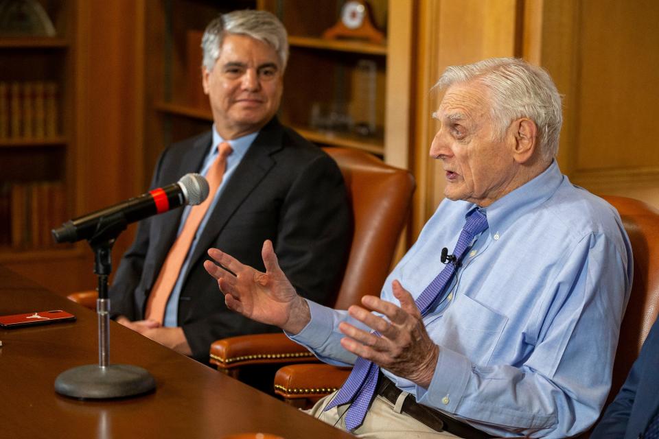 “John was one of the greatest minds of our time and is an inspiration," UT engineering professor Ram Manthiram said of John Goodenough, right, with then-university President Gregory Fenves in 2019.