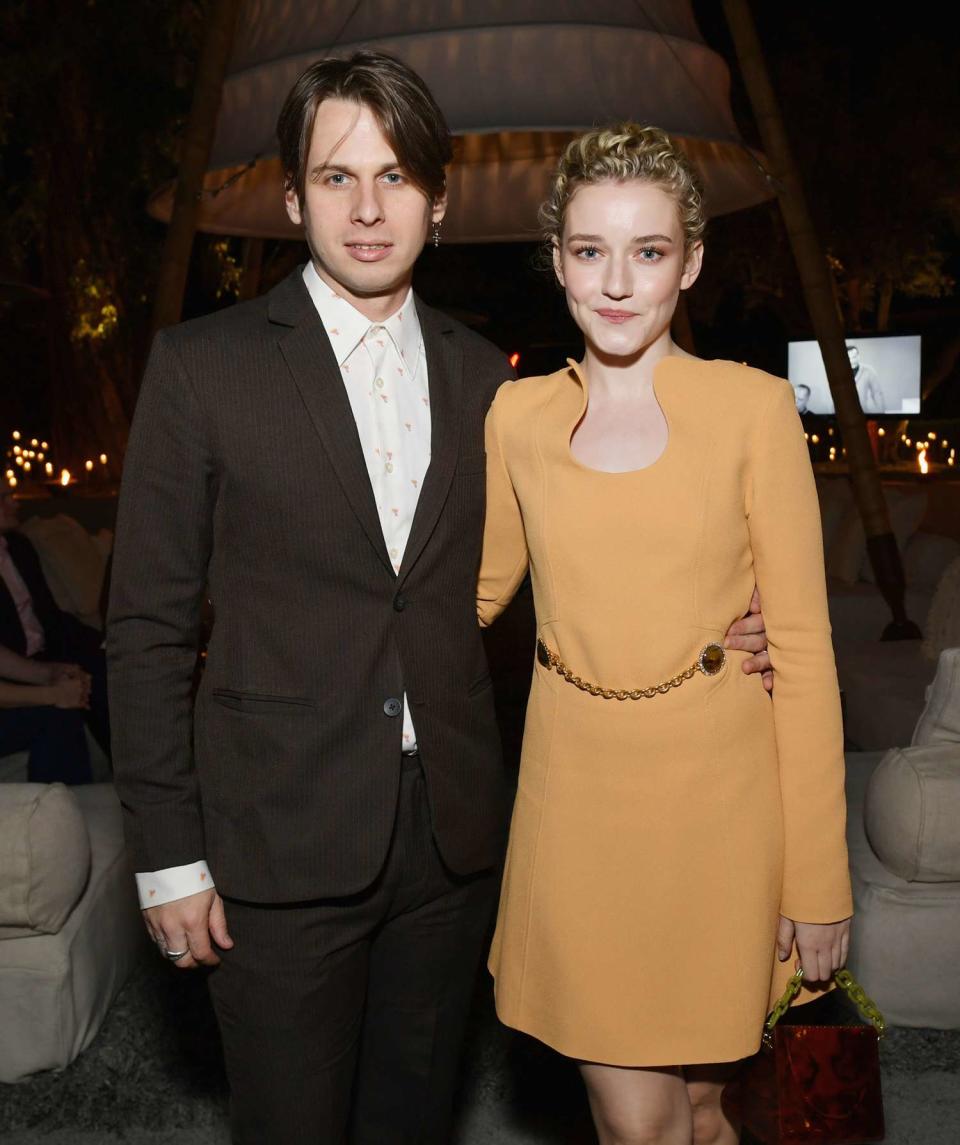 Julia Garner (R) and Mark Foster attend Netflix 2019 Nominees Toast at Private Residence on January 26, 2019 in Los Angeles, California