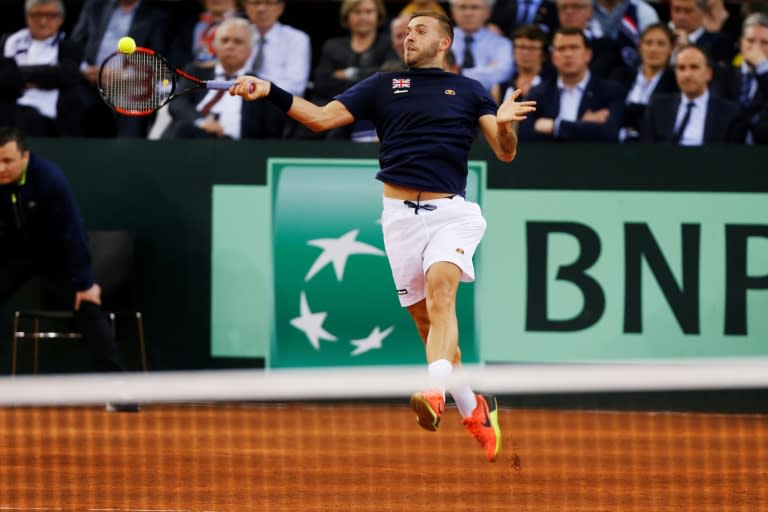 Great Britain's Daniel Evans hits a return to French Jeremy Chardy during their single match of the Davis Cup World Group quarterfinals on April 7, 2017 in Rouen