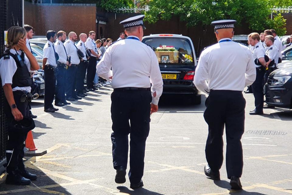 More than 100 Met officers lined the street to pay tribute