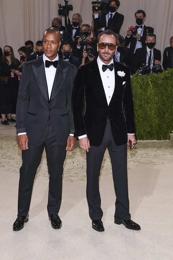 Heron Preston and Tom Ford walking on the red carpet at the 2021 Metropolitan Museum of Art Costume Institute Gala. - Credit: Sipa USA via AP