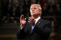 <p>Trump claps after introducing guests during the State of the Union address in the chamber of the U.S. House of Representatives on Jan. 30 in Washington, D.C. (Photo: Win McNamee/Getty Images) </p>