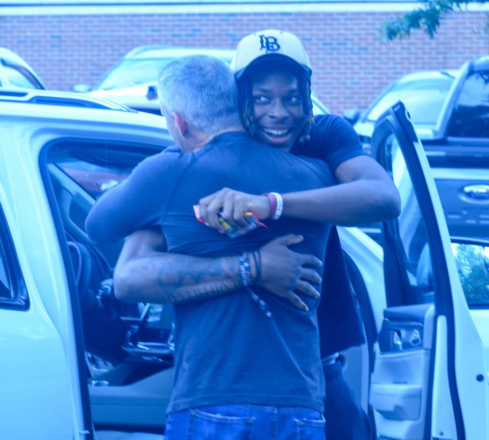 Florida State football head coach Mike Norvell (left) greets 2024 3-star receiver Elijah Moore during an official visit on Friday, June 23, 2023, in Tallahassee, Florida.