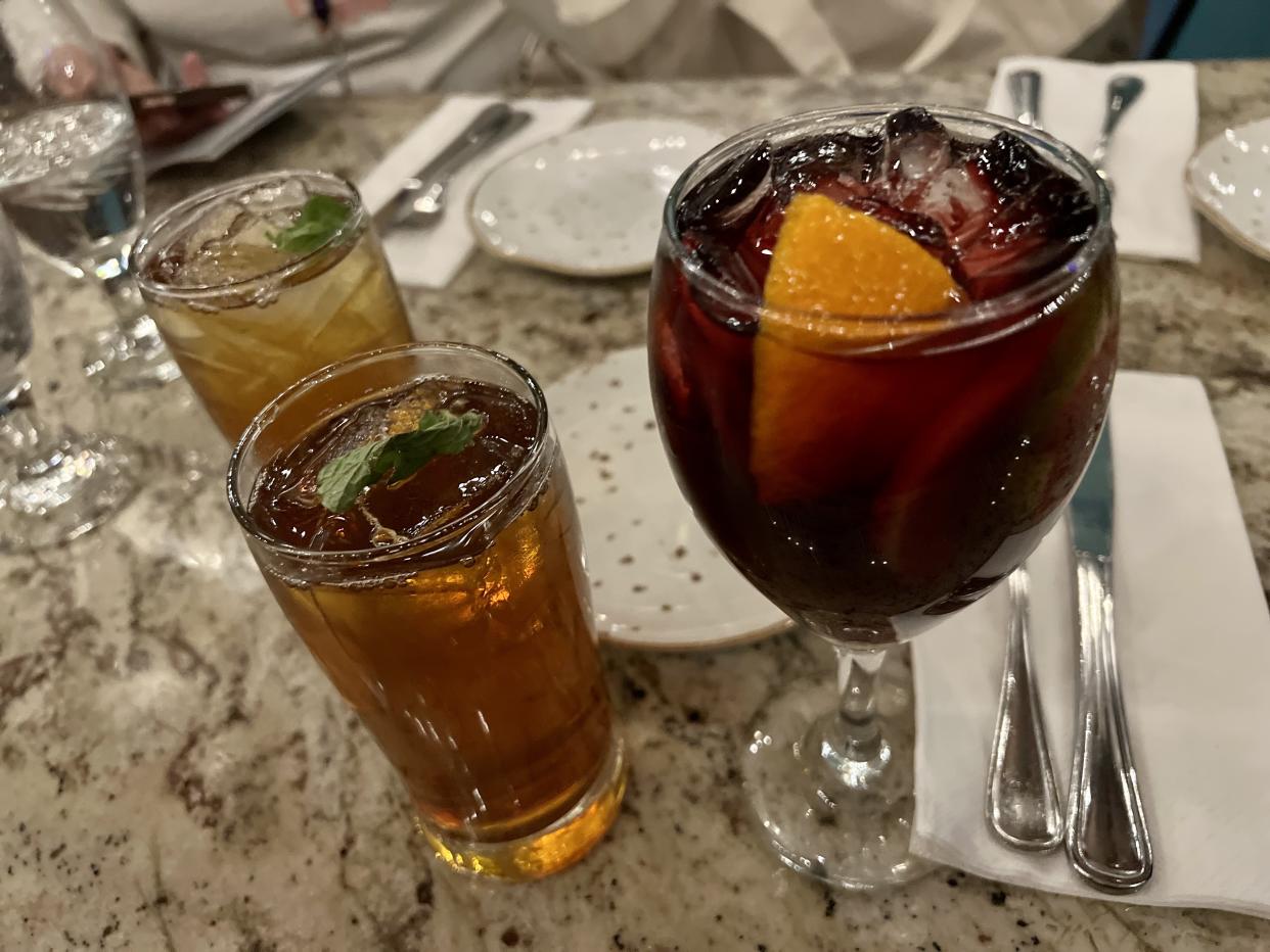 Red sangria and Iced Mint Tea, both made with gin, at Spice Road Table. (Photo: Terri Peters)