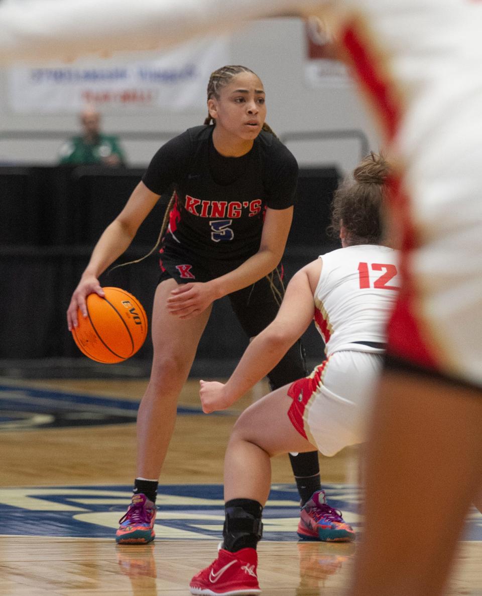 King's Academy's Janessa Williams (5) eyes the Cardinal Mooney defense during the second half of their FHSAA Girls 3-A semifinal at The RP Funding Center in Lakeland Wednesday. February 23, 2022.