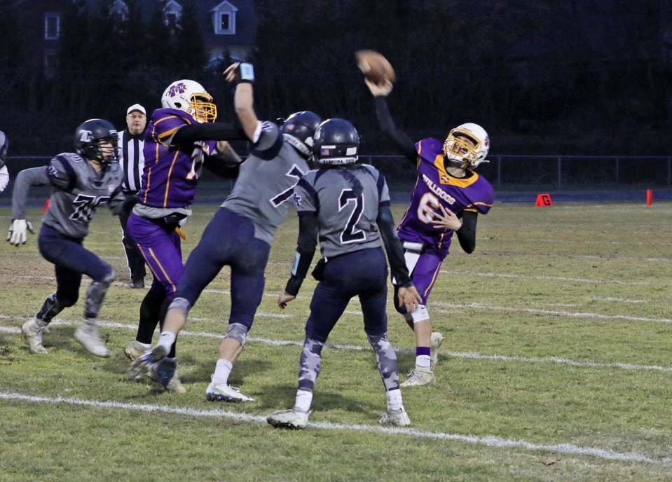 Monty Tech quarterback T.J. Farr throws a pass against Nashoba Tech on Thanksgiving Eve in 2019.