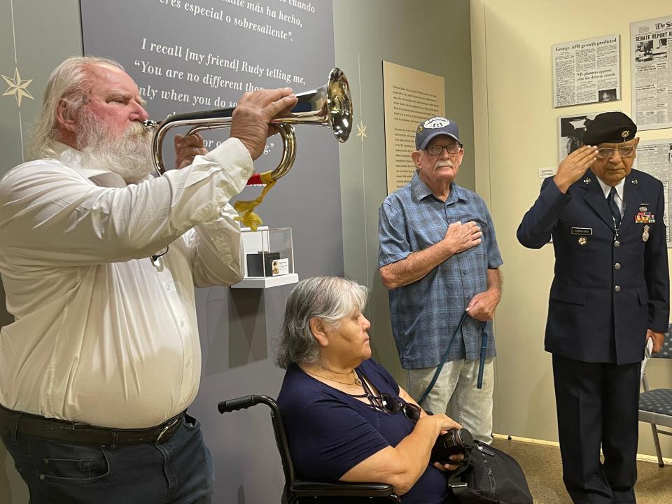 Left to right, Laszlo and Julia Logacz, Mohave Historical Society member Joe Manners and Air Force veteran David Carrasco pay tribute to the late WWII Army Lt. Manuel P. Rodriguez at the Victor Valley Museum in Apple Valley.