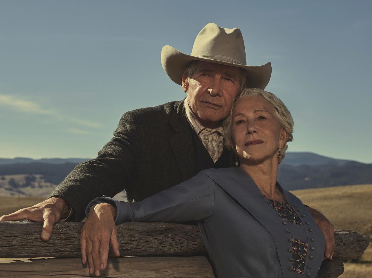 Harrison Ford as Jacob Dutton and Helen Mirren as Cara Dutton outside at their ranch Montana in the series "1923."