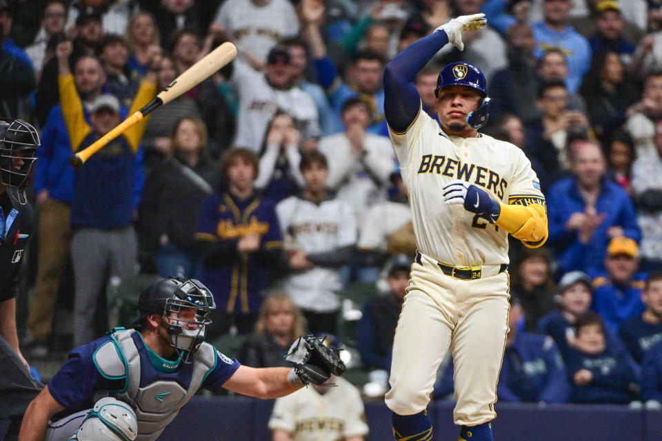 Brewers catcher William Contreras flips his bat aside after drawing a bases-loaded walk in the ninth inning that drove in the winning run against the Mariners on Friday night at American Family Field.