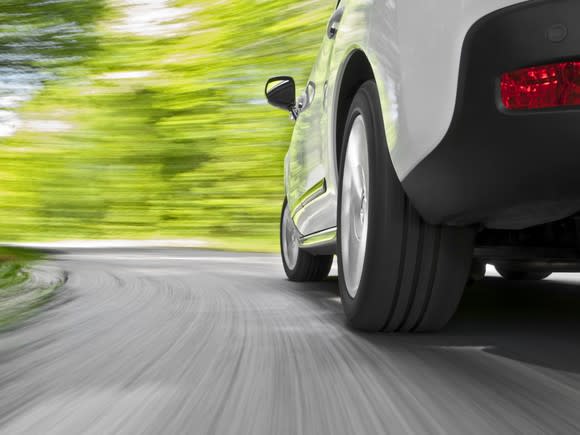 Car driving on a road.