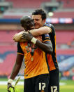 Britain Soccer Football - Hull City v Sheffield Wednesday - Sky Bet Football League Championship Play-Off Final - Wembley Stadium - 28/5/16 Hull City's Mohamed Diame (L) and Harry Maguire celebrate winning promotion back to the Premier League at the end of the match Action Images via Reuters / Tony O'Brien Livepic EDITORIAL USE ONLY. No use with unauthorized audio, video, data, fixture lists, club/league logos or "live" services. Online in-match use limited to 45 images, no video emulation. No use in betting, games or single club/league/player publications. Please contact your account representative for further details.