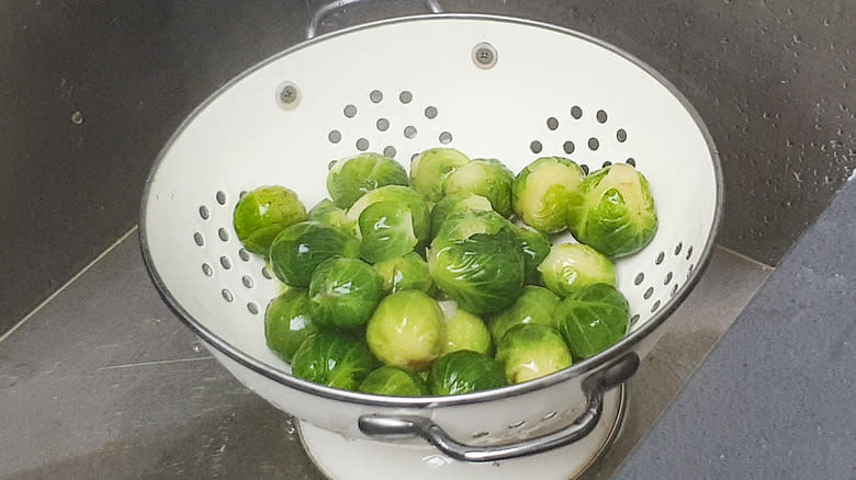 Brussels sprouts in colander