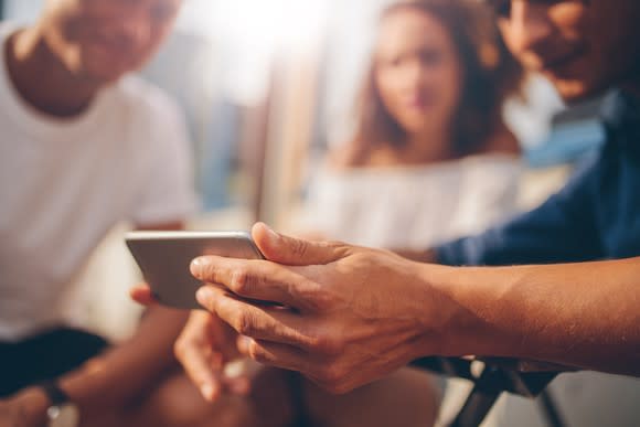 Friends watching videos on a smartphone