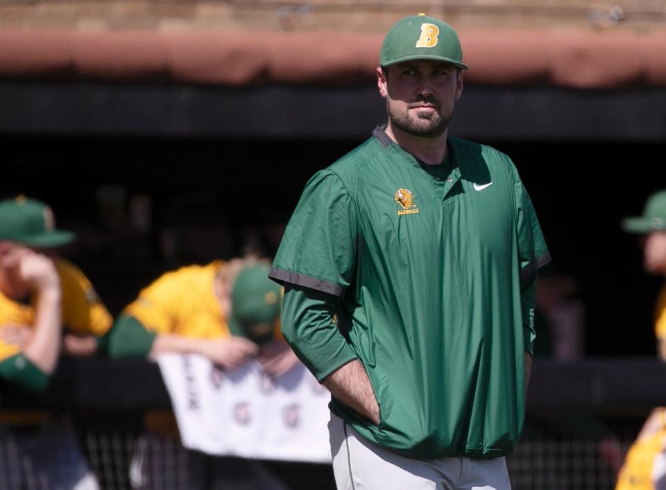 North Dakota State coach Tyler Oakes visits the pitchers' mound during his team's 8-5 loss Saturday to No. 19 Texas Tech in the first game of a doubleheader.