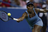 Venus Williams, of the United States, returns during a first-round match against Rebecca Marino, of Canada, at the Citi Open tennis tournament in Washington, Monday, Aug. 1, 2022. (AP Photo/Carolyn Kaster)