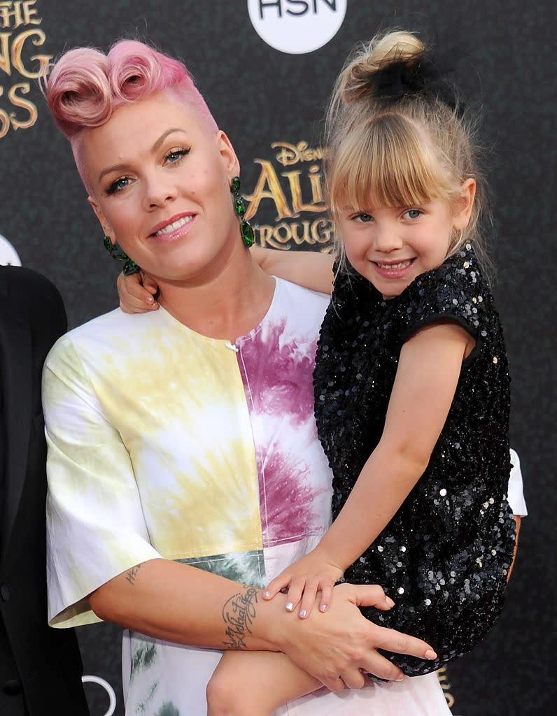 <p>Of course Willow was invited to the red carpet celebration of 2016’s <i>Alice Through the Looking Glass</i>. She even appeared in <a rel="nofollow noopener" href="http://www.eonline.com/news/763341/pink-s-wonderland-themed-just-like-fire-music-video-stars-husband-carey-hart-and-daughter-willow" target="_blank" data-ylk="slk:the video;elm:context_link;itc:0;sec:content-canvas" class="link ">the video</a> for Pink’s song “Just Like Fire” on the soundtrack. Look at that smile! (Photo: Gregg DeGuire/WireImage) </p>