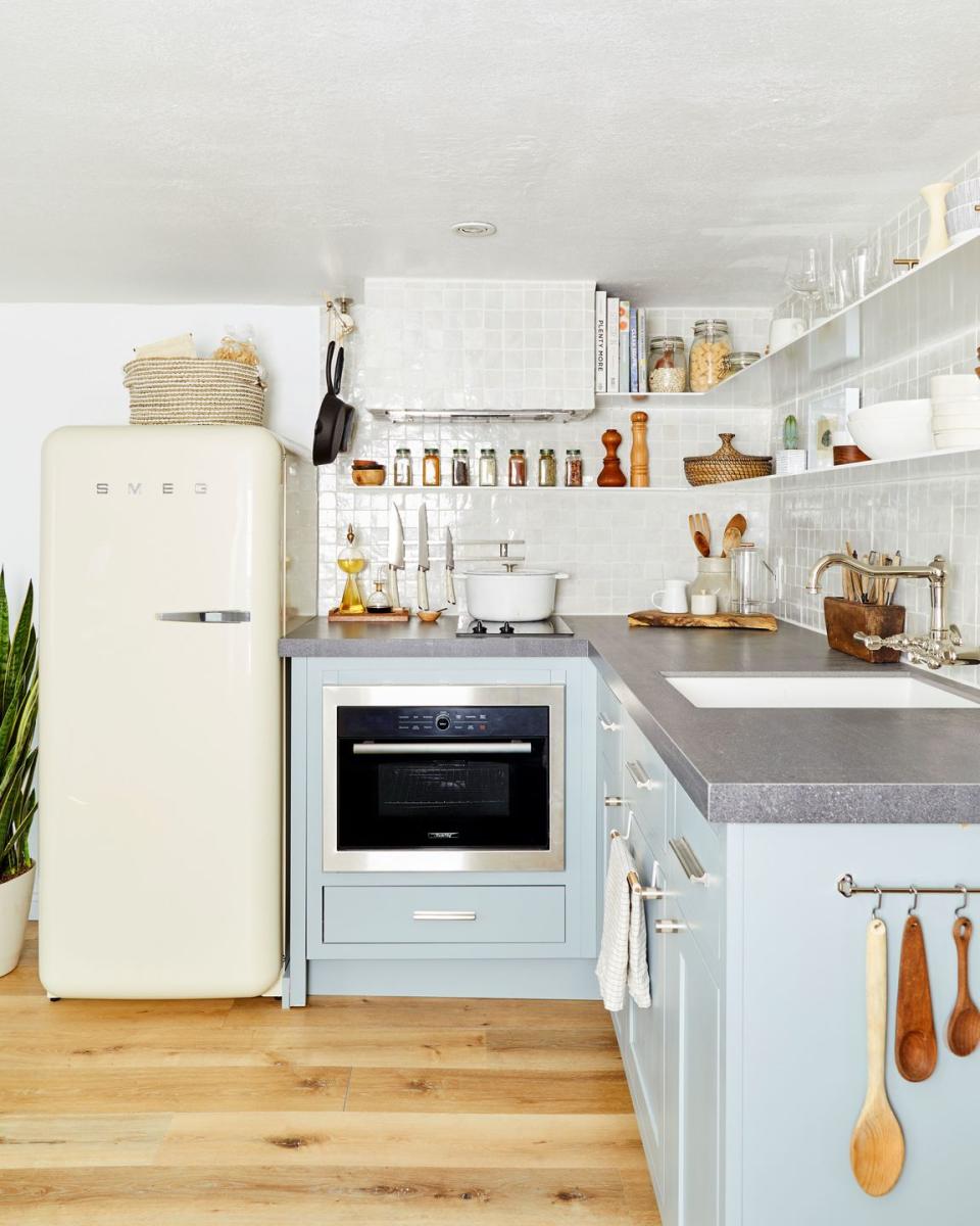 small kitchen idea, pastel blue cabinets and smeg fridge