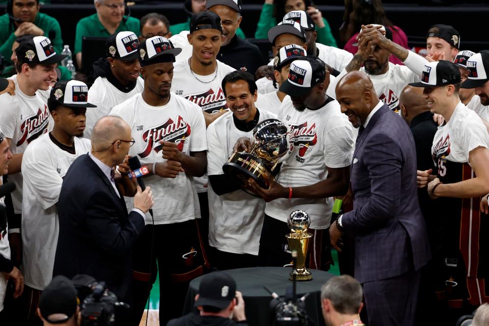 Heat coach Erik Spoelstra celebrates with the team after Miami's Game 7 win over the Celtics.